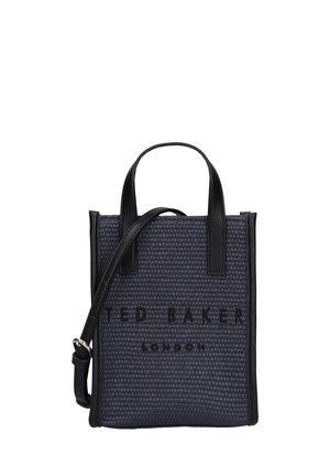 Petit sac cabas texturé bleu marine avec poignées et bandoulière en cuir noir, avec "Ted Baker London" embossé sur le devant.