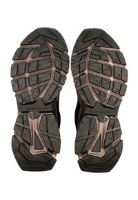Black rubber shoe soles feature deep tread patterns for traction, accented with brown elements. Includes branding on the heel area.