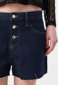 Tommy Jeans HOT PANT - Denim shorts - denim dark