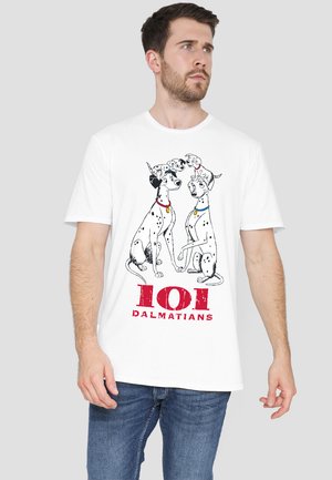 White t-shirt featuring a graphic of two Dalmatians and a puppy, with black spots, colored collars, and "101 Dalmatians" text in red.