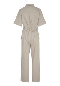 Beige jumpsuit med korta ärmar, elastisk midja, avslappnad passform och raka ben. Har en krage och detaljer med bakstycke.