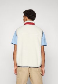 Tommy Jeans OUTDOOR TEDDY MIX MEDIA VEST UNISEX - Liemenė - ancient white/multicolor