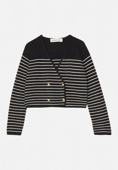 Sort og hvid stribet cropped cardigan med v-hals, prydet med guldfarvede dobbeltknapper og lange ærmer. Blød strikstruktur.