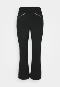 Svarta byxor med figursydd midja, böjda sömdetaljer och fickor med dragkedja. Utrustade med utsvängd ben-design och knapprar vid fållen. Slät tyg.