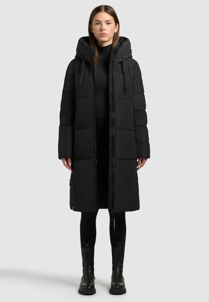 Black padded long coat with a hood, featuring front zipper closure and vertical seam detailing. Smooth texture and structured design.