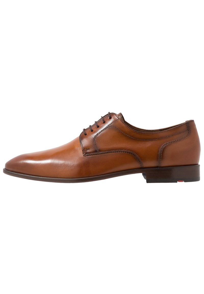 Brown leather dress shoe with a sleek design, rounded toe, and five eyelets for laces. Features subtle stitching and a low heel.