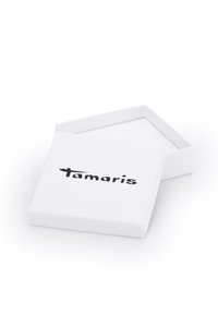 Scatola di cartone bianca con un design piatto e aperto. La parte frontale presenta un logo nero "Tamaris" in un carattere grassetto. Texture liscia, senza motivi.