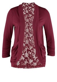 Burgundy cardigan se třetinovými rukávy, s průhlednou krajkovou přední částí s květinovými vzory a dvěma předními kapsami. Měkká látka.