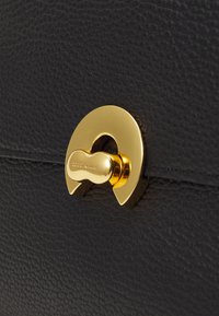 Coccinelle BINXIE - Τσάντα χειρός - noir