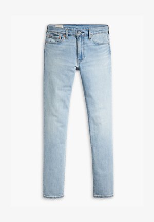 Heledad sinine slim-fit teksapüksid, millel on nööp ja lukk, ees taskud ja vöökohad valgel taustal.