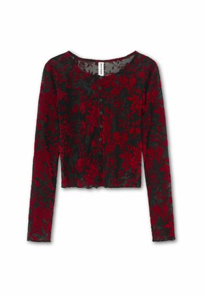 Blusa nera trasparente a maniche lunghe con motivo floreale rosso, colletto rotondo, design cropped, chiusura con bottoni e orlo scallop.