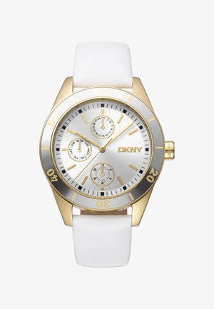 Orologio dorato con quadrante argento, cinturino in gomma bianca, tre sotto-quadranti, indici delle ore dorati e indici dei minuti neri su una lunetta argentata.