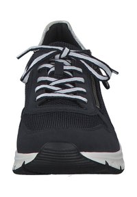 Black athletic shoe with mesh upper, white laces, silver accents, and a textured rubber sole. Features a streamlined silhouette and reinforced toe.