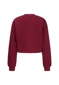Felpa cropped color bordeaux con maniche lunghe, polsini a costine e scollatura rotonda. Texture liscia senza loghi o motivi visibili.