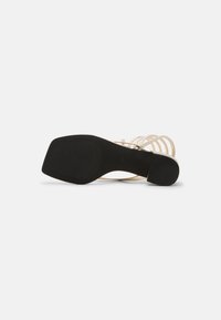 Monki Sandales tongs - gold-coloured