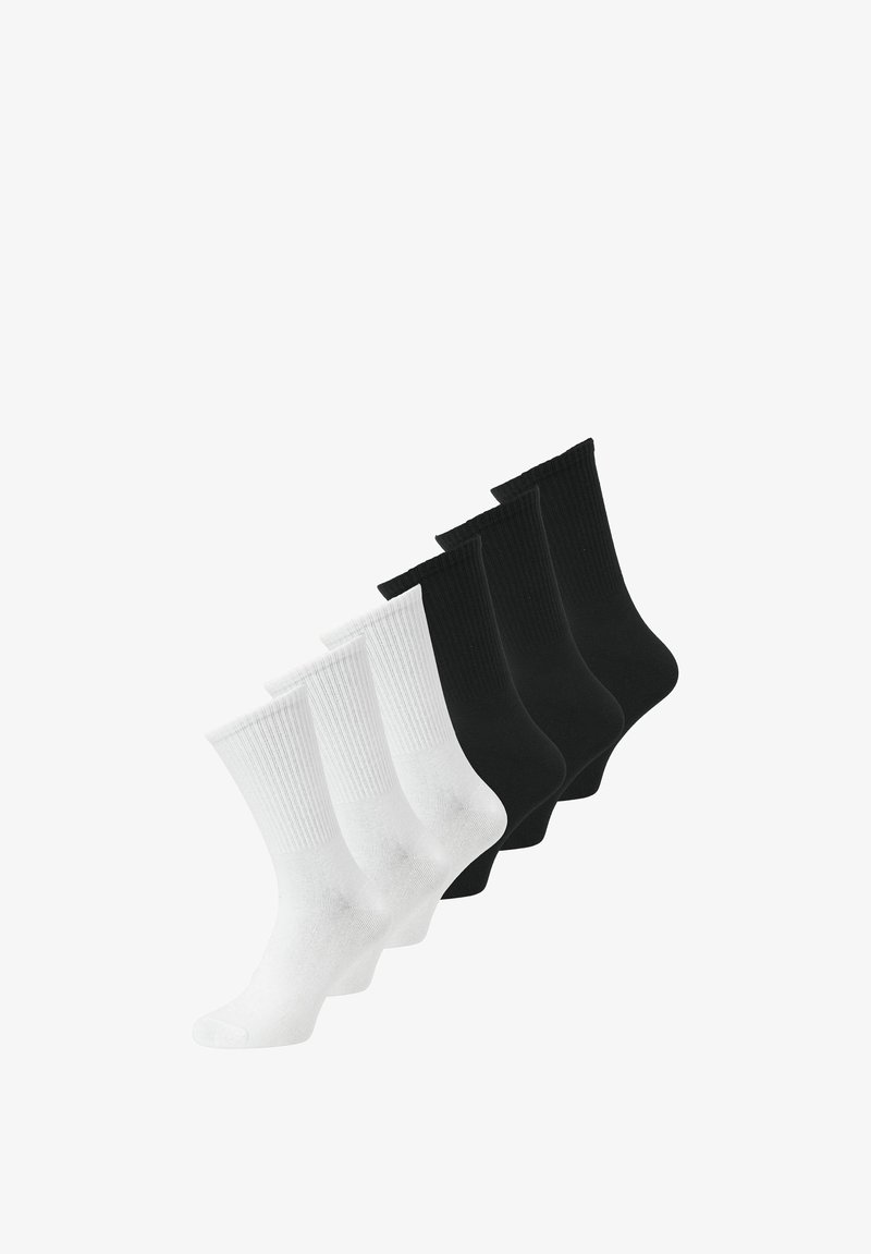 Trois paires de chaussettes blanches et trois paires de chaussettes noires, longueur mi-mollet, disposées côte à côte sur un fond blanc.