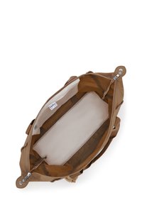 Brown tote bag with beige interior, top zipper closure, and Kipling brand label inside, shown from above with open interior.