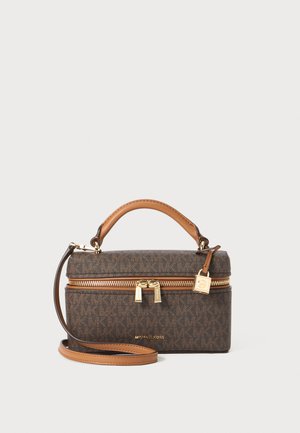 Brown monogrammed handbag with gold hardware, dual zippers, a top handle, and a removable shoulder strap. Textured synthetic material.