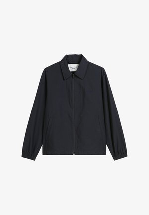 Navy lightweight jacket with a zip closure, point collar, and elastic cuffs; features side pockets and a subtle brand logo on the chest.