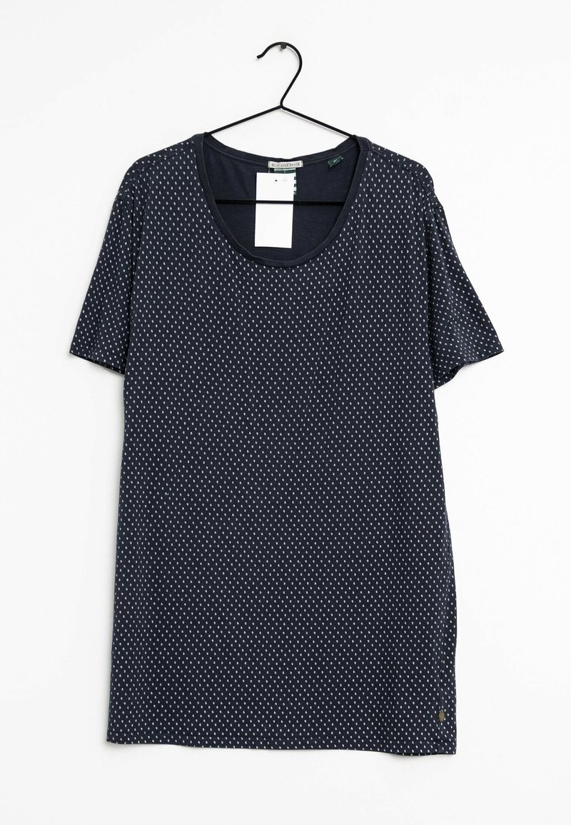 Camiseta navy de manga corta, con cuello redondo y un pequeño patrón de lunares blancos. Confeccionada con tela suave y con una etiqueta colgante adjunta.