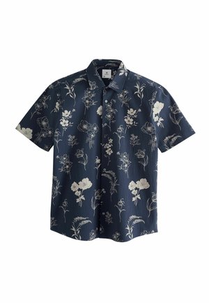 Camicia a maniche corte realizzata in tessuto navy testurizzato con un motivo floreale bianco, chiusura con bottoni e colletto appuntito.