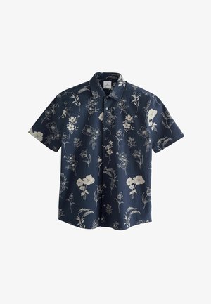 Camicia a maniche corte realizzata in tessuto navy testurizzato con un motivo floreale bianco, chiusura con bottoni e colletto appuntito.