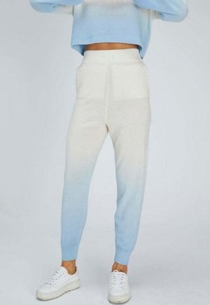 Leichte, gestrickte Jogginghosen mit einem Ombre-Muster, das von Hellblau zu Creme übergeht, ausgestattet mit einem weichen Bund und Rippbündchen.