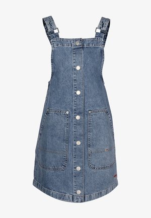 Denim-hamehaalari, jossa on kaksi etutaskua, sininen väri, etukappaleen napitus, säädettävät olkaimet ja logokoriste helman lähellä.