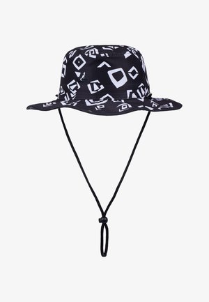 Chapeau seau noir à large bord avec motif de formes géométriques blanches et sangle réglable sous le menton avec cordon de serrage.