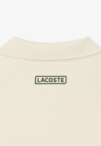 Lacoste SHORT SLEEVES - Piké - blanc écru xfj