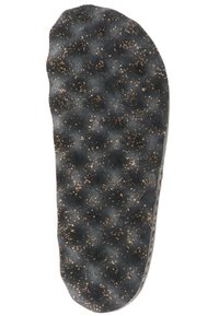 Černá vložka do bot s texturovaným povrchem a vyvýšenými vzory, posetá hnědými skvrnami, navržená pro pohodlí a podporu.