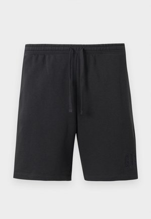 Schwarze Freizeithosen mit elastischem Taillenbund und Kordelzug, mit dezent geprägt eingebettetem Markenlogo am unteren linken Bein.