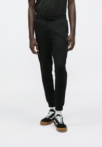Jack & Jones JJIGORDON JJSHARK - Donji dijelovi trenirke - black