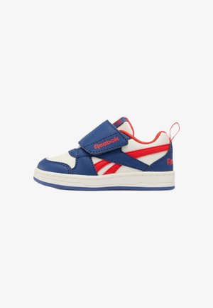 Scarpa da ginnastica Reebok per bambini in blu, bianco e rosso con chiusura in velcro e linguetta sul tallone, vista di profilo su sfondo bianco.