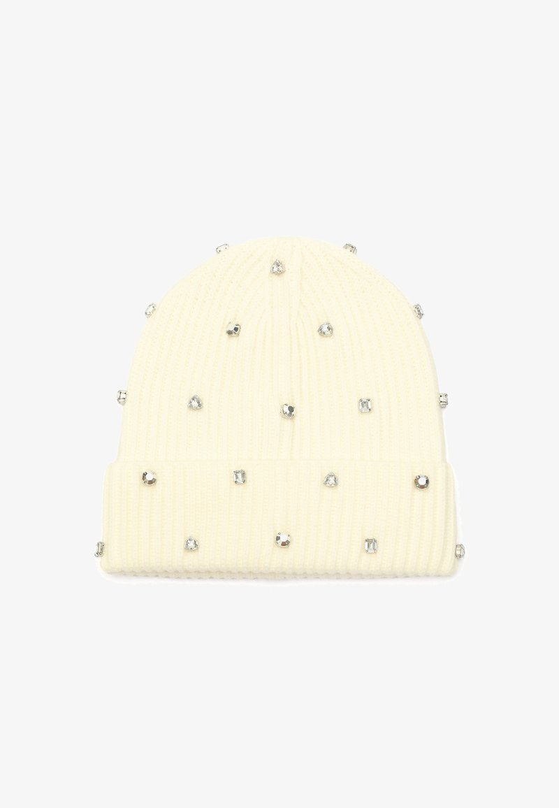 Knitted white beanie with ribbed texture, featuring scattered rhinestones and a folded brim.