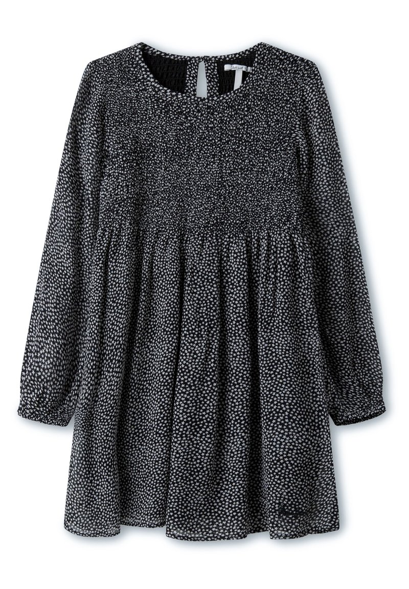 Schwarz-weißes Kleid mit langen Ärmeln, gerafftem Bund, rundem Ausschnitt und Schlüsselloch-Rücken. Enthält ein gesprenkeltes Muster und weichen Stoff.