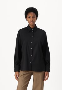 DRYKORN LYSILA - Skjortebluse - black