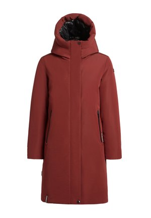 Rust-colored parka with a large, insulated hood, featuring two zippered pockets and a smooth texture. The inner lining is black.
