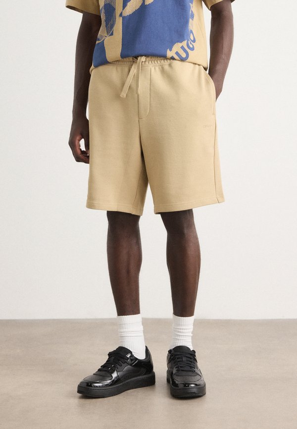 DAYONO - Tracksuit bottoms - medium beige