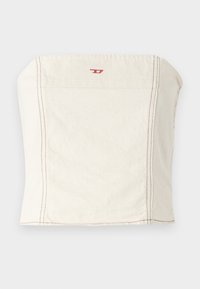 Heleda beež, kehaümber kleepuv lühike topp, mis on valmistatud puuvillast, sirge dekolteega, minimaalse õmbluse detailide ja väikese punase logoga ees.