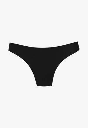 String noir en tissu lisse et extensible. Dispose d'un design minimal avec des côtés échancrés et une finition sans coutures.