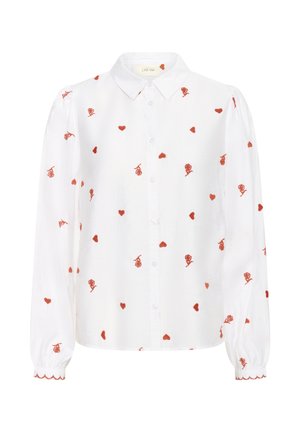 Chemise blanche à boutons avec manches longues, ornée de broderies de roses rouges et de cœurs. Les poignets à bords festonnés ajoutent une touche de détail aux ourlets des manches.