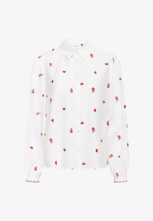 Chemise blanche à boutons avec manches longues, ornée de broderies de roses rouges et de cœurs. Les poignets à bords festonnés ajoutent une touche de détail aux ourlets des manches.