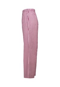 Red and white striped pajama pants with an elastic waistband, straight legs, and lightweight fabric. Vertical stripes run down the length.