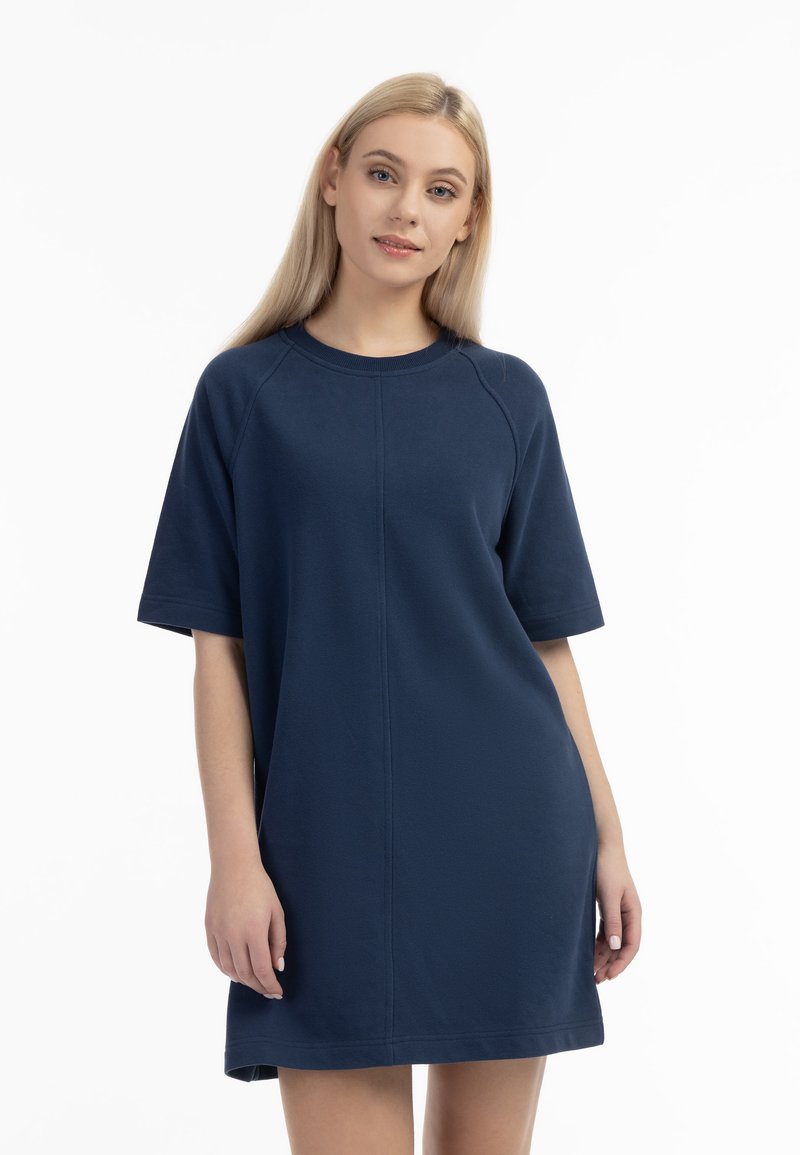 Navyblauwe jurk met korte mouwen, gemaakt van zachte stof, met een ronde halslijn, een losse pasvorm en naaddetails aan de voorkant. Glad textuur, casual ontwerp.