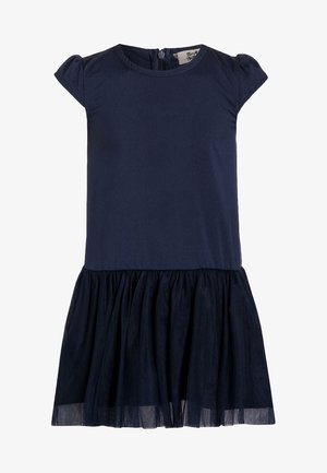 Robe marine avec de courtes manches bouffantes, un corsage ajusté et une jupe en tulle superposée. Comprend une fermeture éclair au dos et est en tissu coton doux.