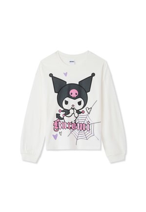 Camicia bianca a maniche lunghe con un personaggio dei cartoni animati nero e rosa che indossa un cappello da giullare, una ragnatela, cuori viola e il nome "Kuromi" in testo rosa.