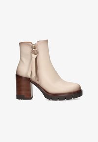 Seleccionado, beige