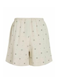 Jasnonitowe szorty z elastycznym pasem, z powtarzającym się wzorem diamentów w kolorze czarnym oraz małymi kropkami. Miękka, teksturowana tkanina.