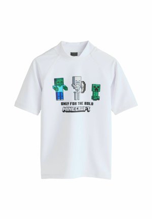 Hvid kortærmet skjorte med Minecraft-figurer — zombie, skelet med bue og creeper — og teksten "Kun for de modige Minecraft."